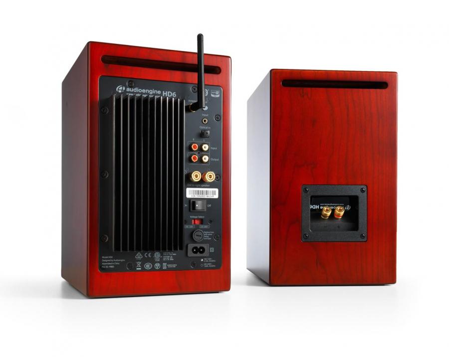 The connections and heatsink of the powered unit along with its passive counterpart, here in a Cherry finish