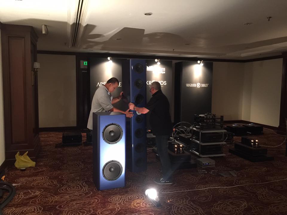 In hi-fi creations room - adjsuting the large speakers.