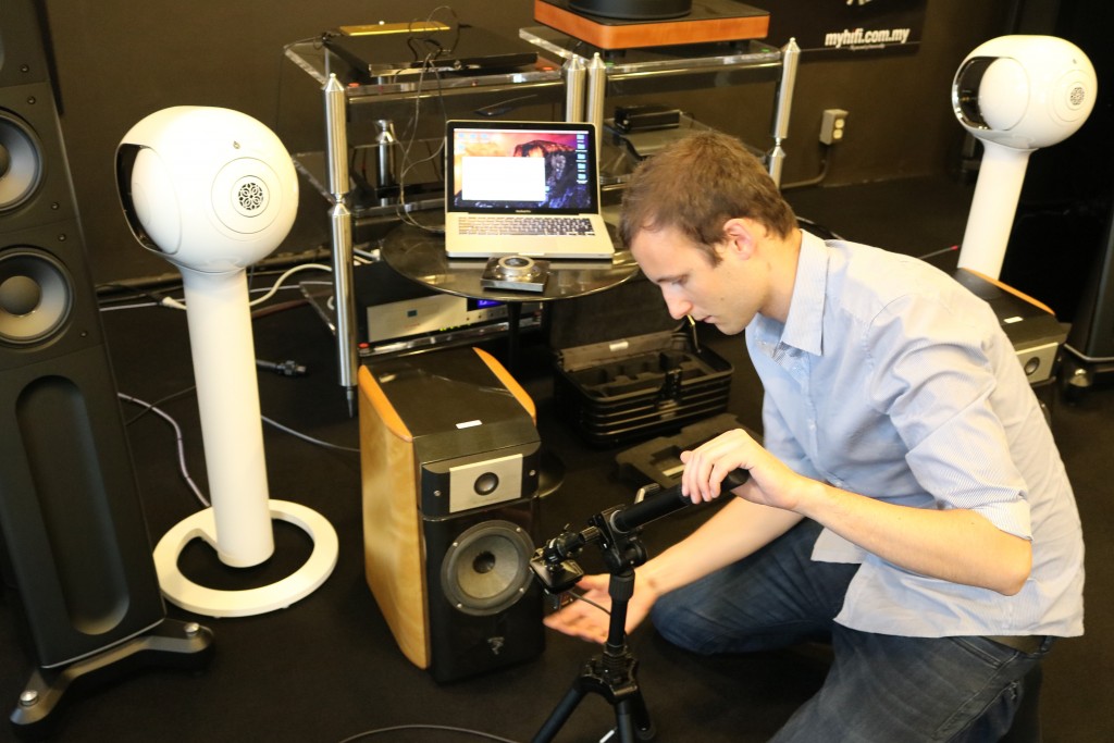 Devialet engineer Maxime Dumont adjusting the laser unit.