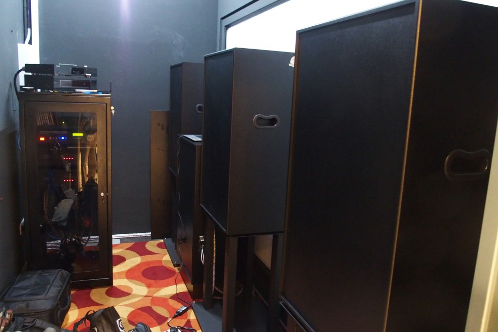 The Fidek Cinema System speakers, sub-woofer, surround sound processor and amps located in a small room behind the screen.