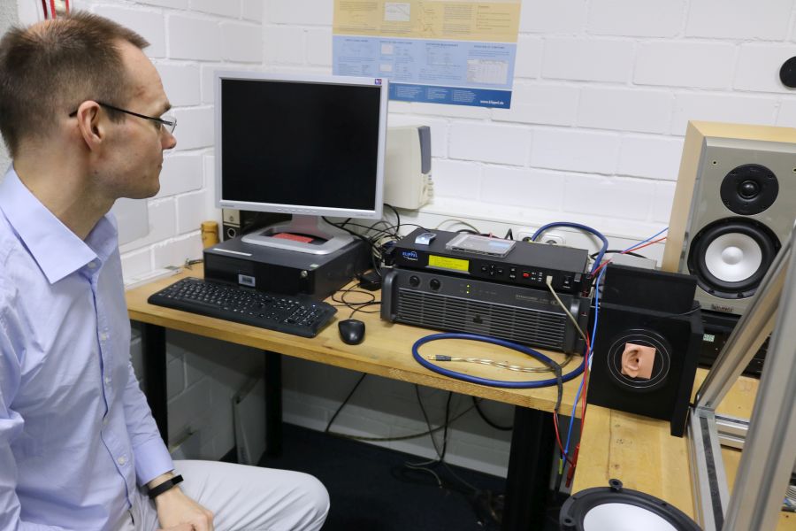 Christian tataking a reading of a woofer using the Klippel system.