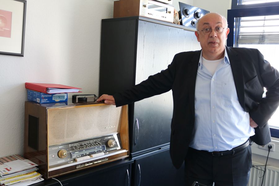 Shandro is a collector of vintage hi-fi. In his office is a Saba radio.