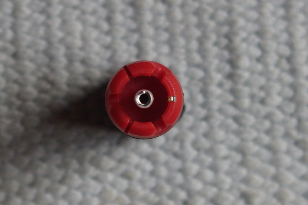 Eichmann's plugs use very little metal. The negative connection is the small dot of metal.