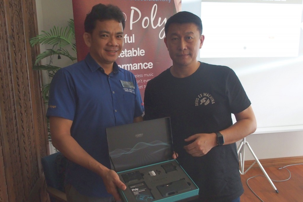 Centre Circle boss Nelson and Robert wong showing the limited edition Moo-Poly box-set.
