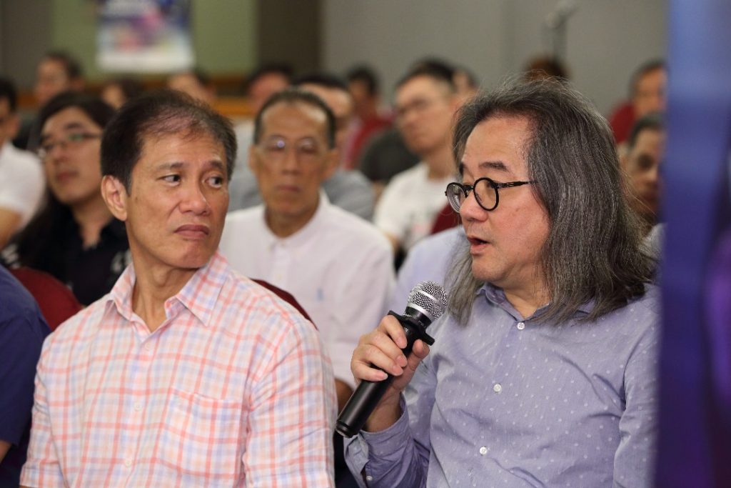 Joseph Ki (right) taking questions on the art of high fidelity from members of the press