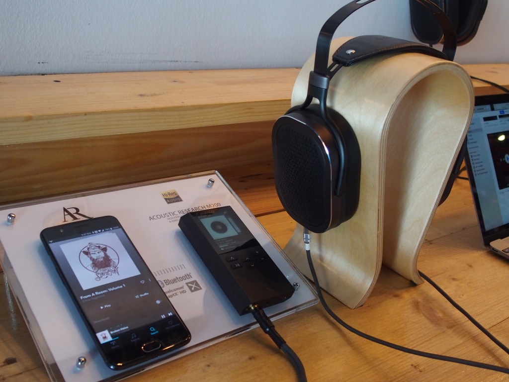 The AR-M200 Bluetooth musicj player jjwith a handphone (left) streaming the music files.