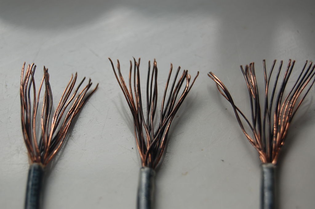 A change in color from copper to black is sign that you need to do a little maintenance on your speaker cables