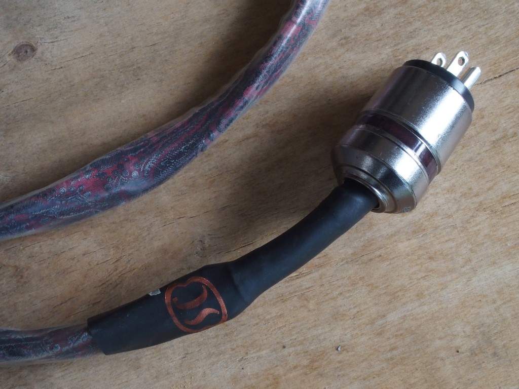 Note the gentle twist to the condutjors and the metal housing of the plugs.
