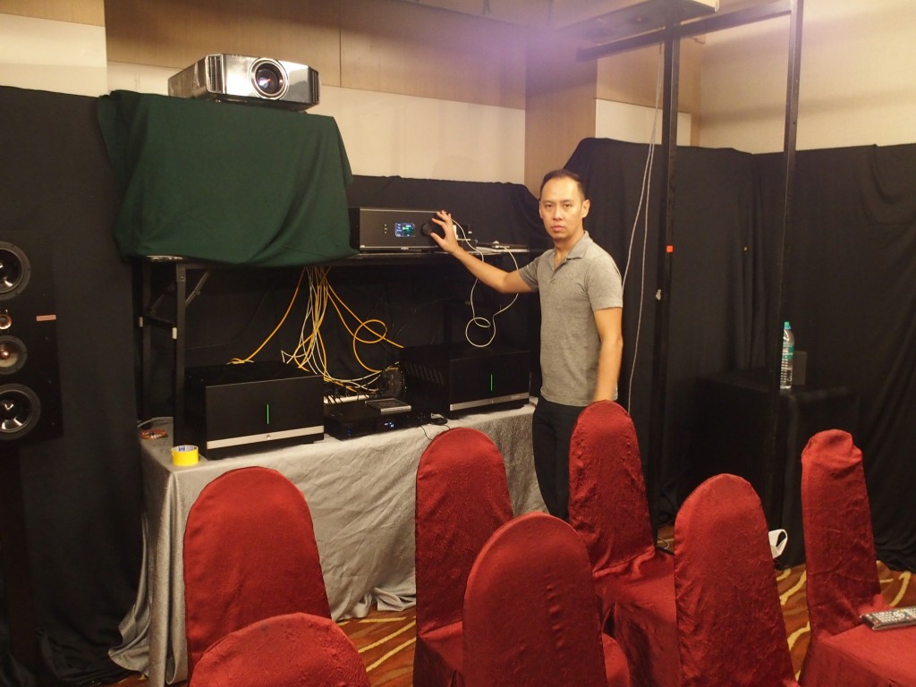 Tan Chung Wei of Movee Space tweaking his AV system.