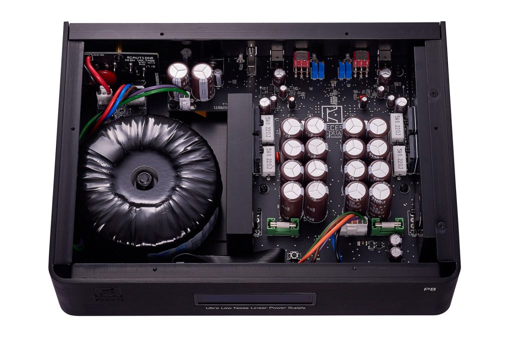 The inside of the P8 is packed with quality components to ensure the best performance. Note the array of capacitors and solid, large toroidal transformer on the left
