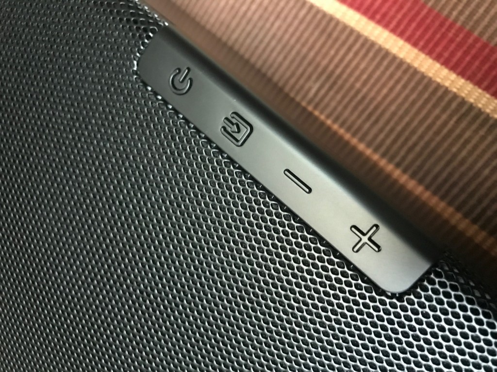 Tactile controls on the top of the Q90R are color matched to blend in seamlessly