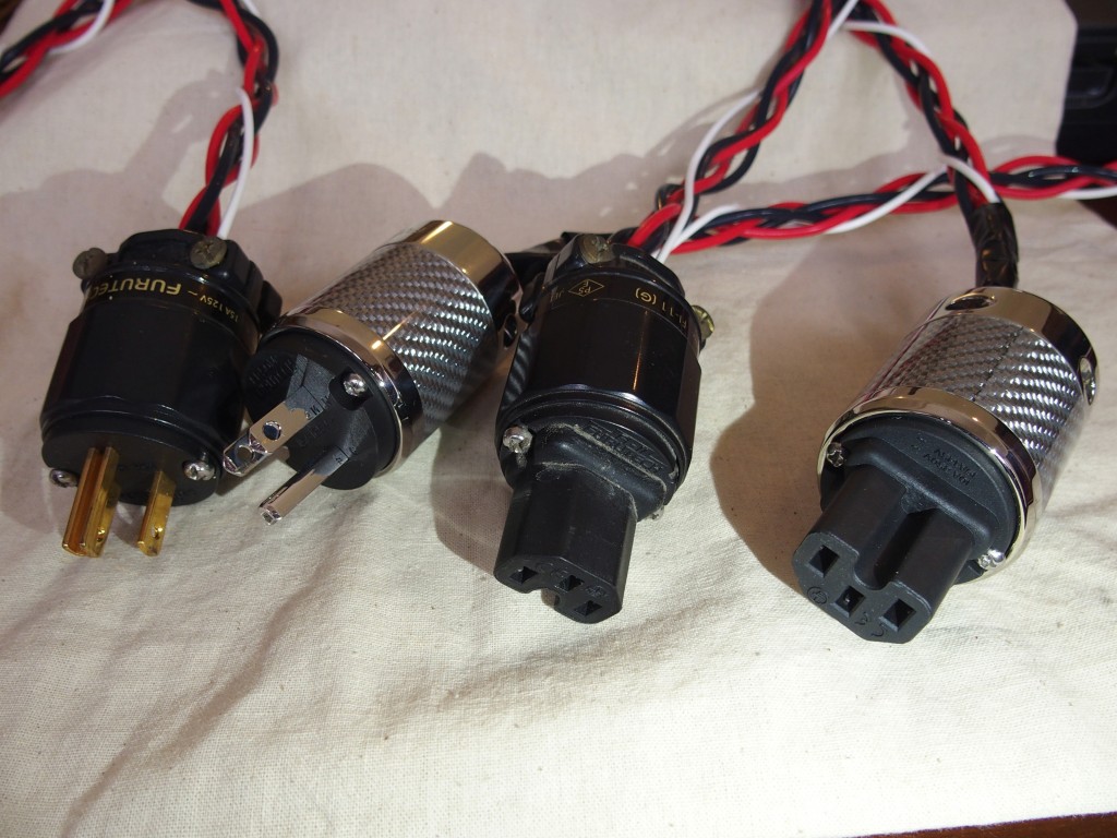 The older cabl wih Furutech F!60 (G) plugs and the new cble wih the FI50 NCF plugs. 