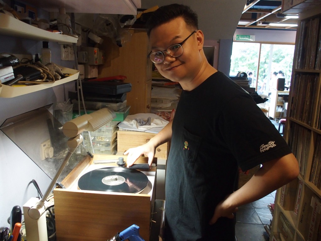 Adrian Wong's son, Joseph, is helping to run the outlet and also clean the records.
