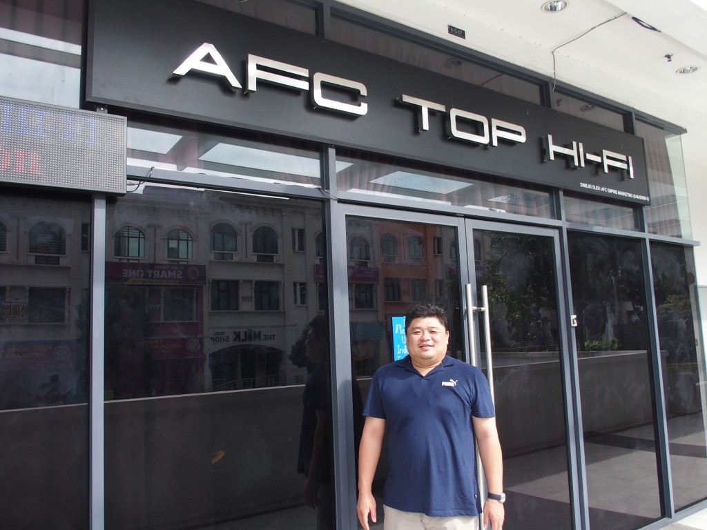 Matthew Ong posing joutsidehis hi-fi shop in Bandar Kinrara 5, Puchong.