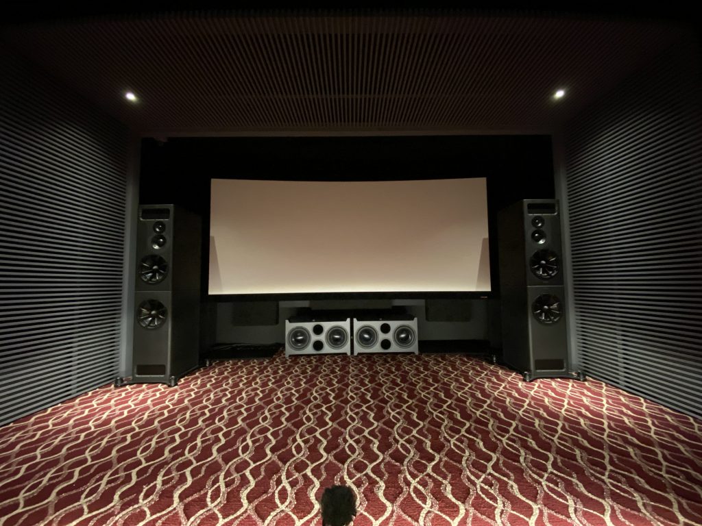 The View from the “Hot seat” just before the demo began. Note the pair of SSW-2 Subwoofers just below the screen