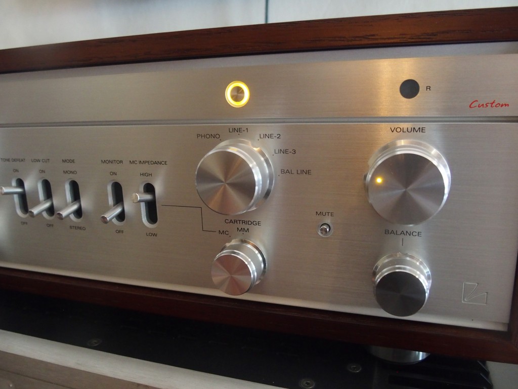 The preamp has a light on its volume knob.