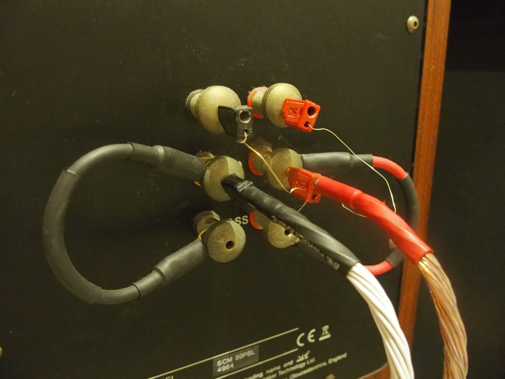 For years, I have plugged the speaker cables into the middle terminals as this resulted in the most balanced sound.